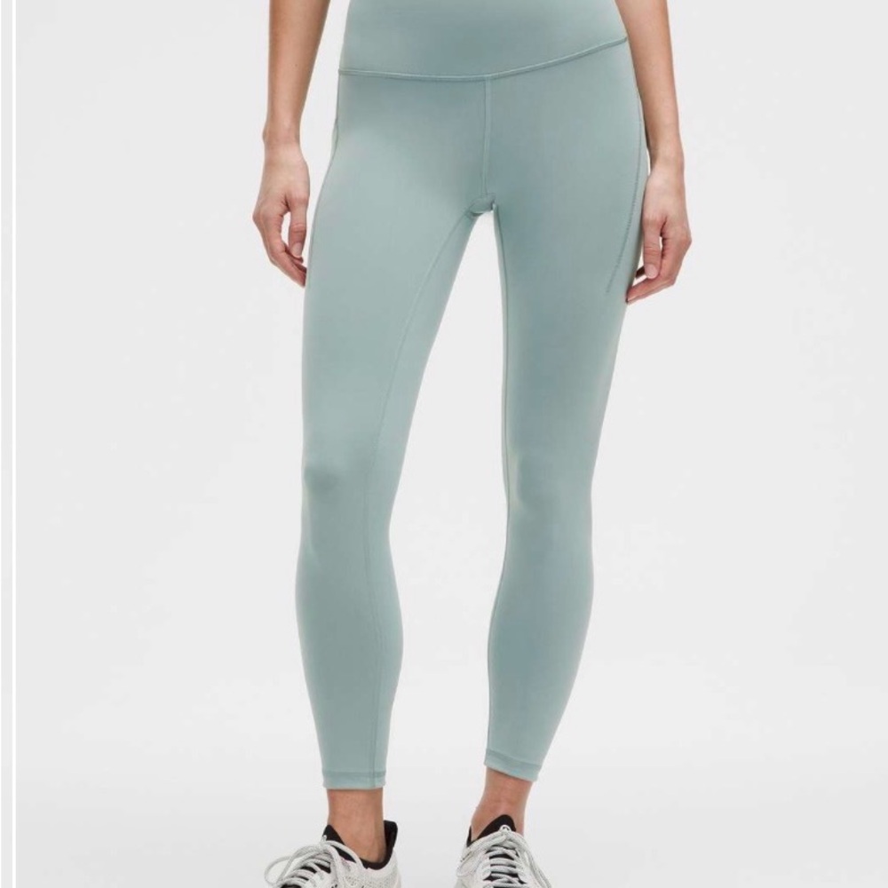 SOLD- Lululemon Wunder Train High-Rise Tight with Pockets 25"